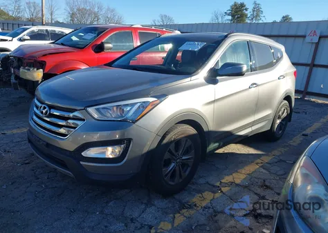 2014 Hyundai Santa Fe Sport 2.4L z USA, uszkodzony, nr VIN 5XYZU3LBXEG181085